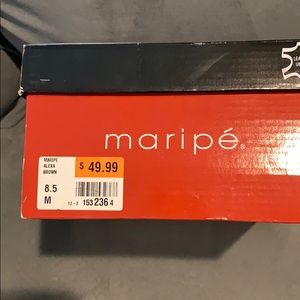 Brown pumps with gold accents